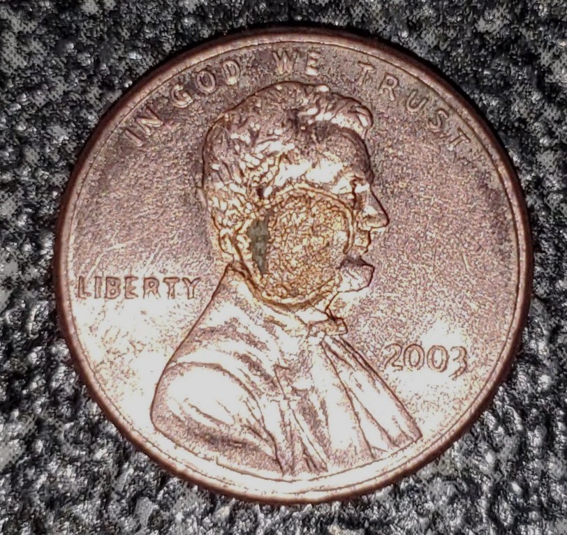 2003-Lincoln-Cent-With-A-Cancerous-Jaw